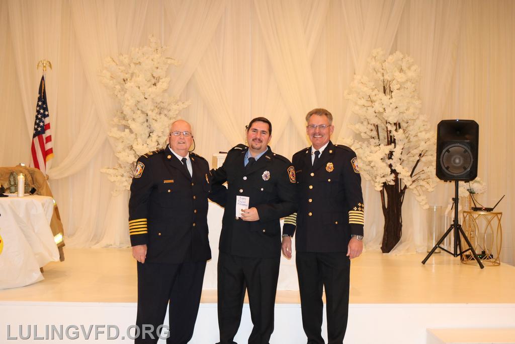 3 year service pin - Khaled Mohammed (center)